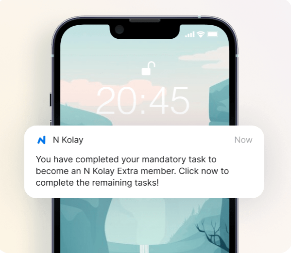Smartphone screen at 20:45 displaying an N Kolay push notification: "You have completed your mandatory task to become an N Kolay Extra member. Click now to complete the remaining tasks!"