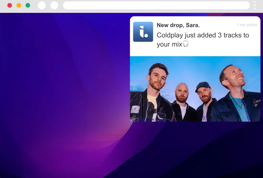 A desktop notification over a purple background says "New drop, Sara. Coldplay just added 3 tracks to your mix." Below the text is a photo of the four members of the band Coldplay.